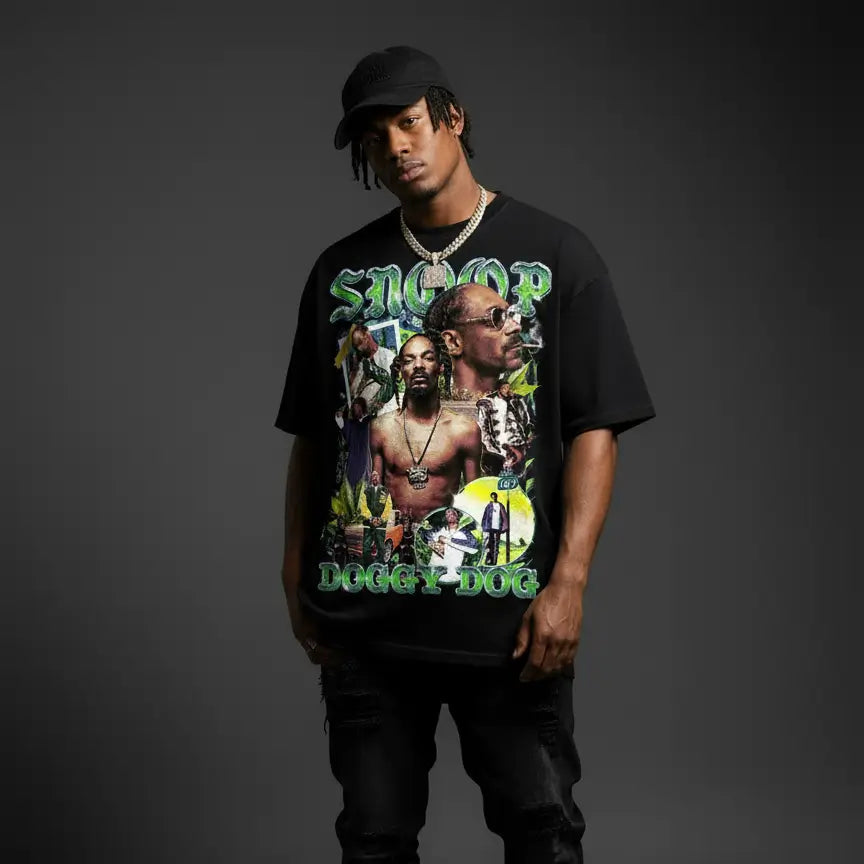 Person wearing a black t-shirt with graphic design and text on a dark background